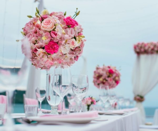 Table setting at a luxury wedding and Beautiful flowers on the table.